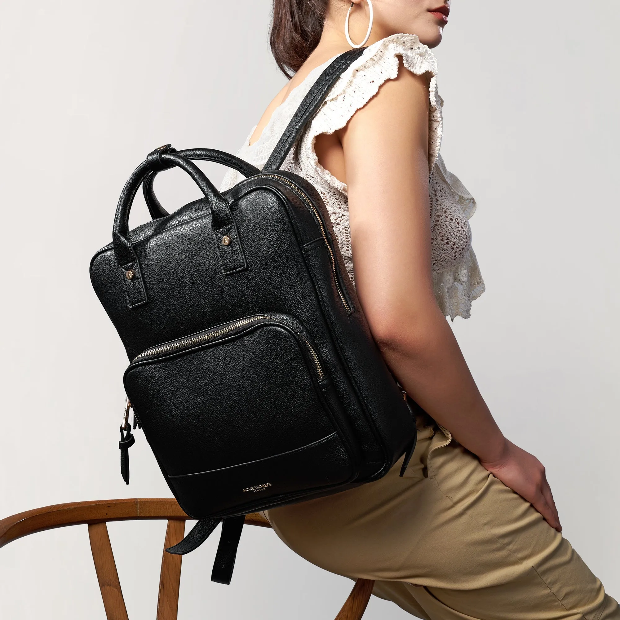 Black Faux Leather Backpack With 12 Laptop Sleeve