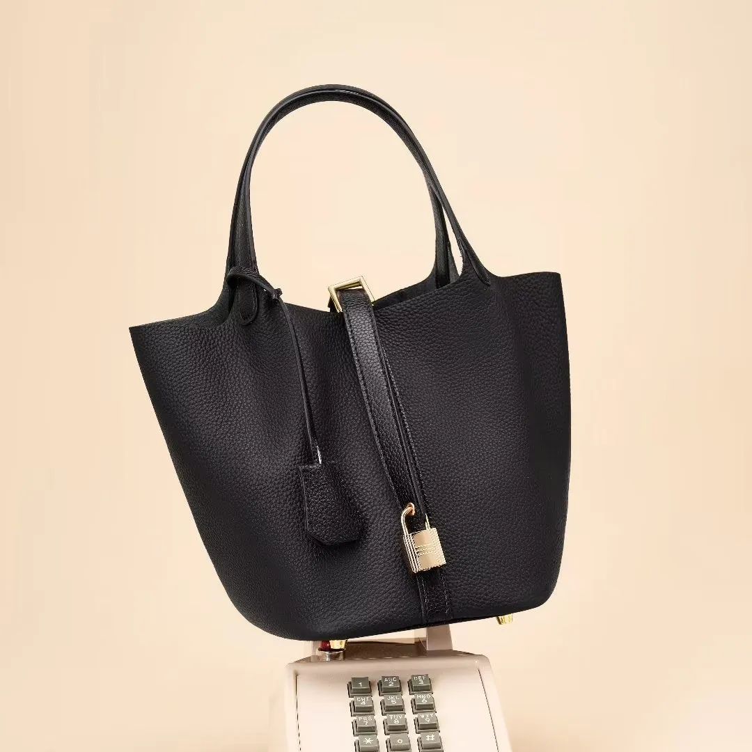 LuxeLeather Chic Closure Bucket Bag